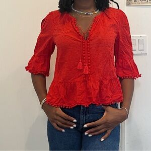 Red eyelet blouse